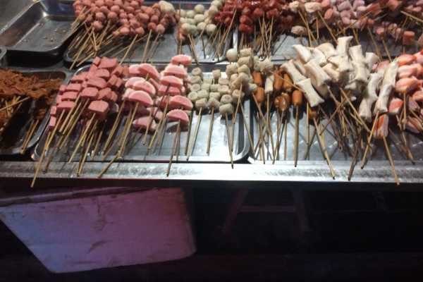 Hekou - Food on sticks when Eating Cheap and Local