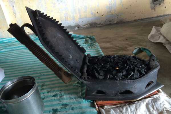 Coal heated irons at the Dhobi Khana Washing Collective in Fort Kochi