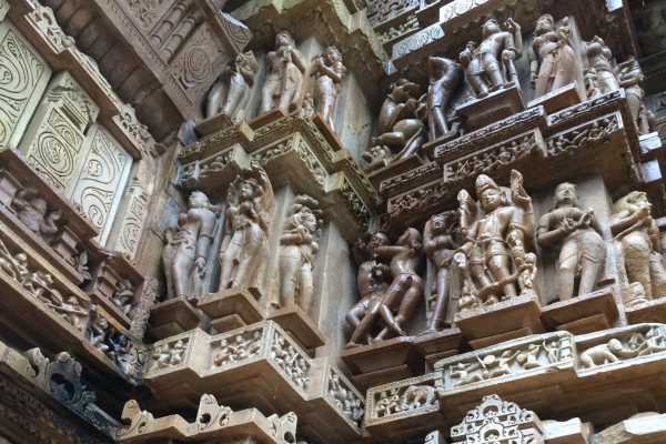 Erotic carving high up at Khajuraho