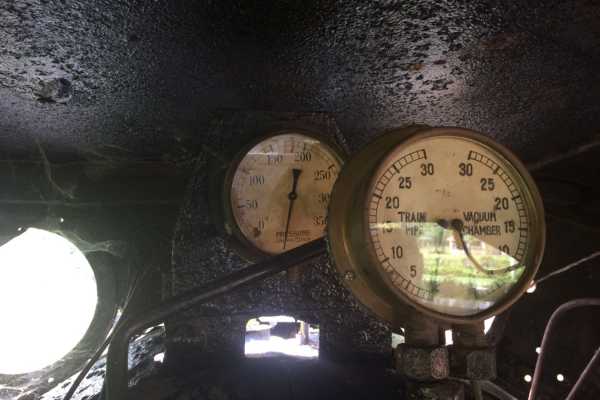 Inside old locomotive on Thai Burma Railway Thanbyuzayat