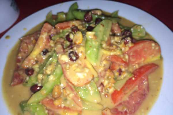 Tomatoes in peanut sauce in Hsipaw Myanmar