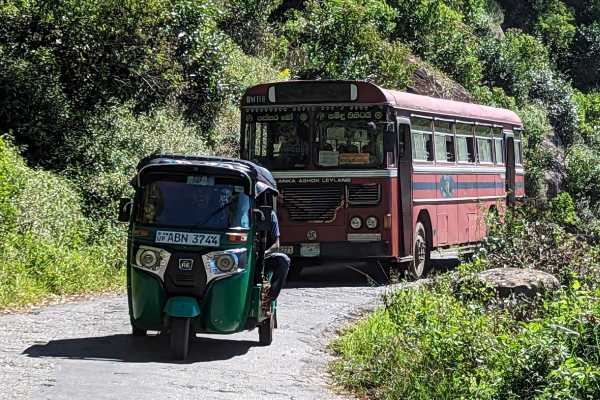 SLTB Bus in Sri Lanka with Tuk-tuk