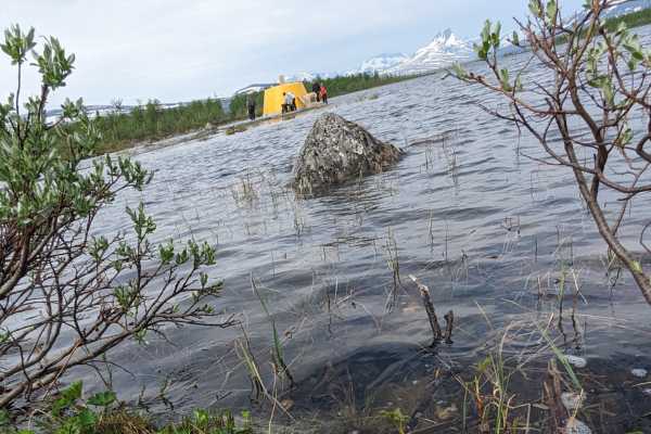 3 country cairn in the lake