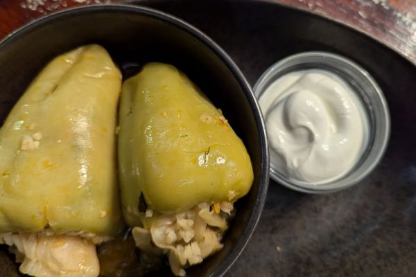 Stuffed green bell pepers with sour cream