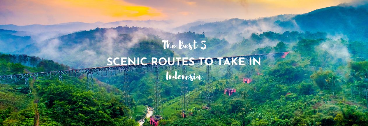 A lush, mist-covered landscape in Indonesia at sunrise, featuring a long railway bridge stretching across dense green hills. Soft golden and pink hues from the rising sun color the sky, adding warmth to the tranquil scene. Overlay text reads, "The Best 5 Scenic Routes to Take in Indonesia" in a bold and playful font.