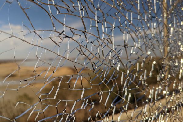 Cracked Glass on Window of Metro Sahel