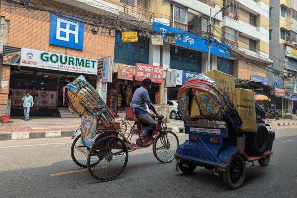 Rickshaw and CNG on the streets of Dhaka