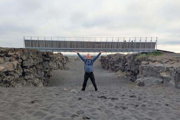 Iconic Photo holding up the bridge at the Bridge  between Continents