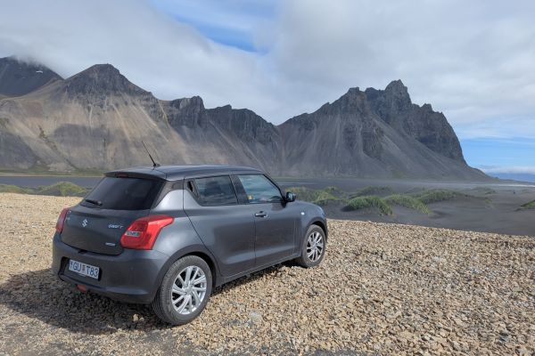 Our rental car parked on gravel road at Vestahorn on the Stokknes peninsula